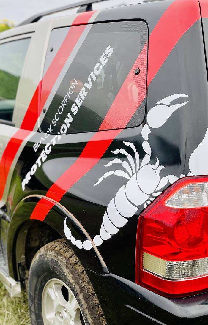 Black Scorpion company vehicle in company livery